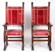A pair of large late 16th century walnut and upholstered armchairs, French, circa 1600 Each having a