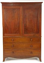 A George III flame mahogany linen press, having a pair of cupboard doors opening to reveal five