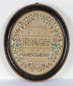 An early 19th century sampler by Jane James of Norwich (aged 10) dated 1805, depicting a verse,