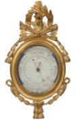 A Louis XVI style gilt Barometer, French, the frame set with an eagle with a quiver of arrows