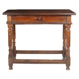 A Charles I oak side table, circa 1640 Having a twin-boarded top with square-edge, a flush frieze