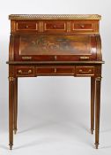 A Louis XV style roll top ormolu mounted and painted roll top desk, the brass pierced gallery top