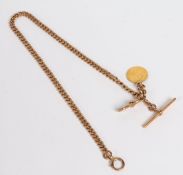 A 9 carat gold pocket watch chain, with clip ends, central sliding T bar and George V half sovereign