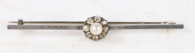 A platinum bar brooch with central pearl surrounded by a band of eight diamonds, 57.6mm wide, 4.6g