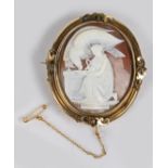 A Victorian shell cameo brooch, the cameo depicting  Hebe and the eagle, housed in a swivel mount