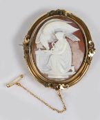 A Victorian shell cameo brooch, the cameo depicting  Hebe and the eagle, housed in a swivel mount