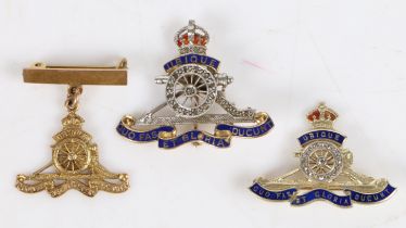 Three Royal Artillery gold brooches, the first in 9 carat gold with enamel and diamonds to the