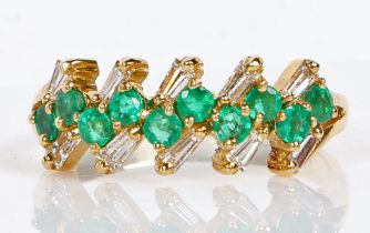 An 18 carat gold, emerald and diamond ring, with ten round cut emeralds mounted in pairs and flanked