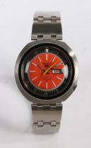 A Seiko 5 Sports 6119-6400 "UFO" gentleman's stainless steel wristwatch, the signed orange dial with