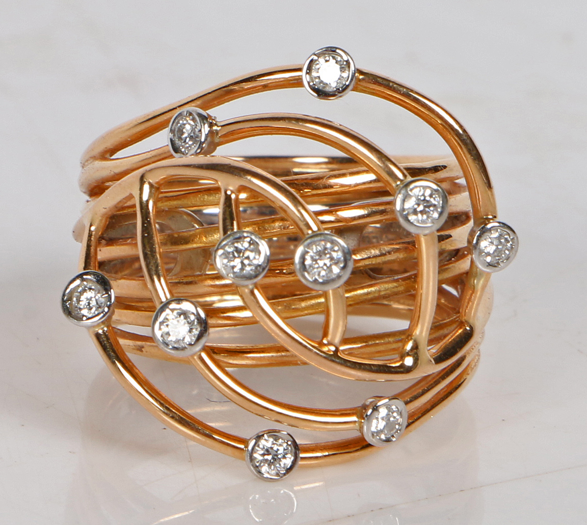 Alessandro Pagani, An 18 carat gold and diamond set ring, the ring formed from eight gold bands