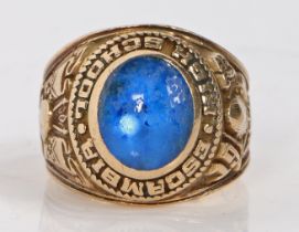 An American 10 carat gold College style ring, the oval blue paste set head with inscription "