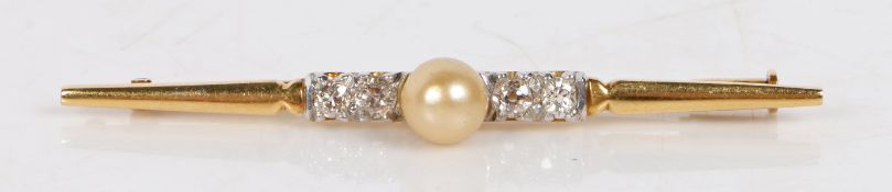 An 18 carat gold bar brooch, set with a central pearl flanked by four diamonds, 51mm wide, 4.1g