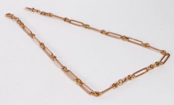A 9 carat gold pocket watch chain, formed from oval links, with a clip to each end, 57cm long, 50g