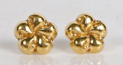 A pair of 18 carat gold ear studs, modelled as stylised five petal flower heads, 2.3g excluding