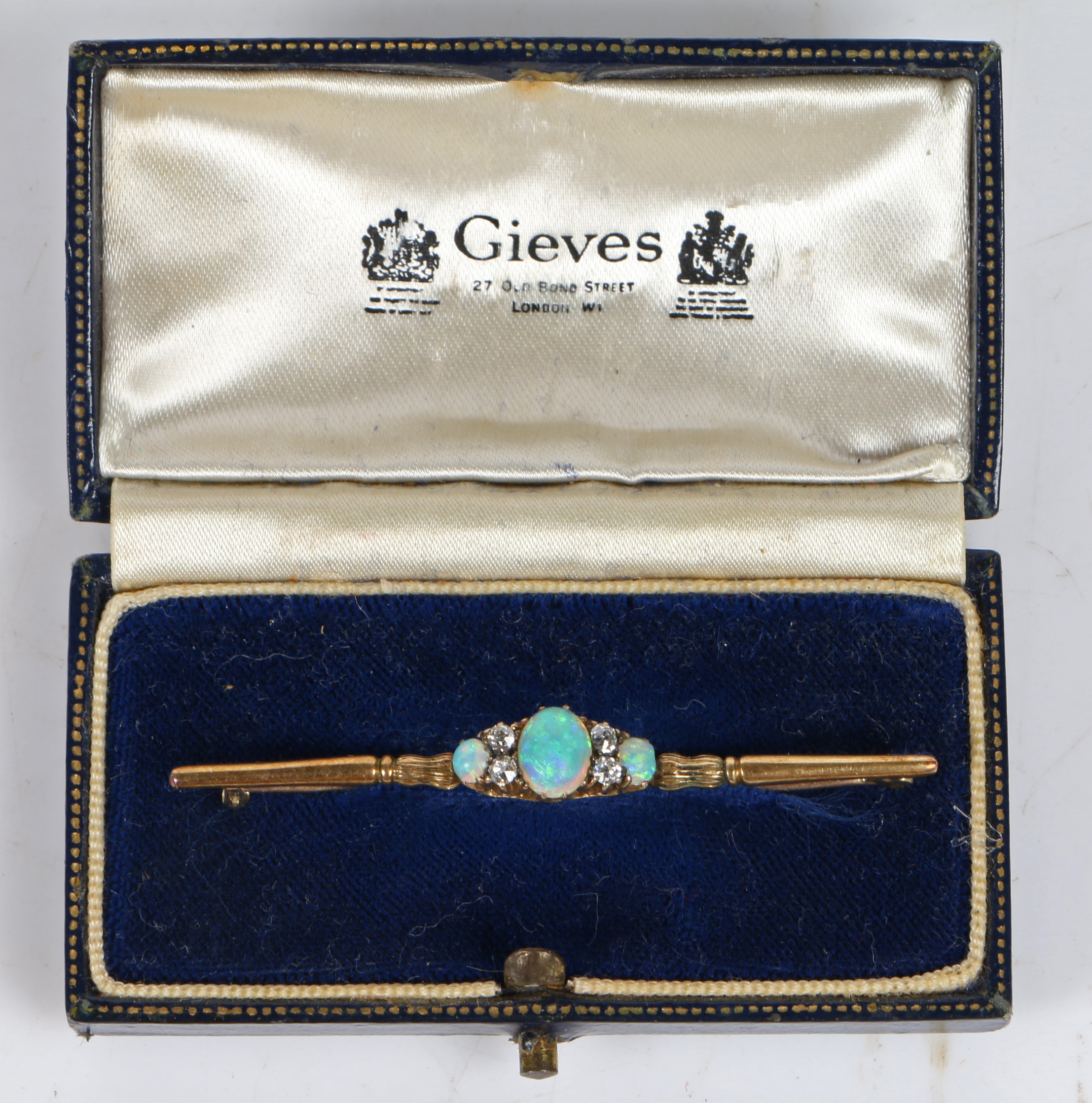 An 18 carat gold bar brooch set with a central oval opal flanked by four diamonds and a further - Bild 4 aus 6