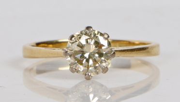 An 18 carat gold solitaire ring, the round brilliant cut diamond at approximately 1ct. ring size