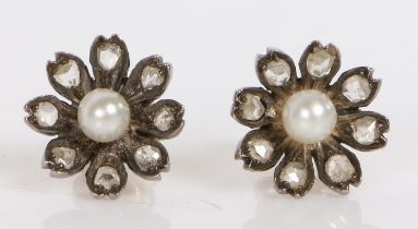 A pair of rose cut diamond and pearl earrings, of flower head form, the central pearls with eight