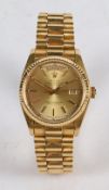 A Rolex Oyster Perpetual Day-Date 18 carat gold gentleman's wristwatch, model no.18038, case no.