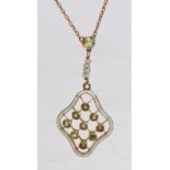 A 9 carat gold, peridot pearl and white enamel pendant necklace, the white enamel pendant with