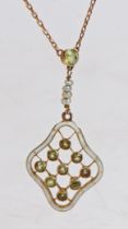 A 9 carat gold, peridot pearl and white enamel pendant necklace, the white enamel pendant with