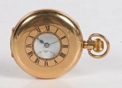 An Edward VII 9ct gold half hunter pocket watch, the white enamel dial with Roman numerals, outer