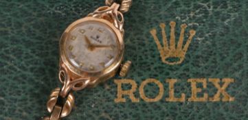 A Rolex 9 carat gold ladies wristwatch, the signed silver dial with Arabic markers, manual wound,