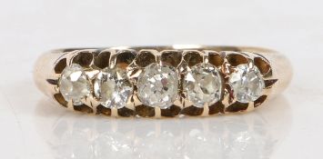 An 18 carat gold ring set with five graduated diamonds, the central stone measuring 3.4mm