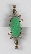 A white metal, jade and diamond pendant, modelled as Guanyin surrounded by twelve baguette and