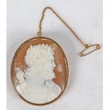 A 9 carat gold cameo brooch, the cameo depicting a classical bearded gentleman in profile with a