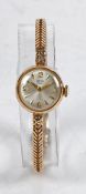 A Tudor 9 carat gold ladies wristwatch, the signed silver dial with alternating Arabic and