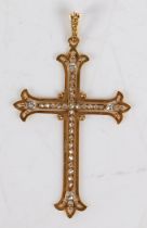 A French gold and diamond mounted cross pendant, the beaded bail above a diamond set cross with