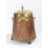 A 19th Century Dutch copper and brass peat pail, the brass lid above a tapering body embossed with