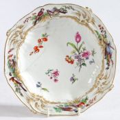 An 18th Century Chelsea porcelain plate, circa 1760-70, the central field with foliate polychrome