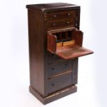 A Victorian rosewood secretaire Wellington chest, the rectangular top above seven graduated drawers,