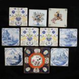 A collection of ten 18th century and later tiles, to include four delft blue and white tiles,