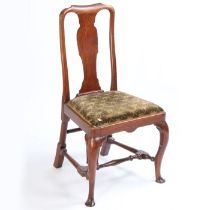 A George I red walnut chair side chair, the arched top rail above a vase splat and drop in seat