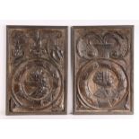 A pair of 17th Century framed Romayne panels, with fleur de lis and scroll carved pediments above