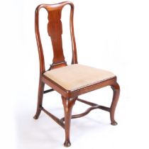 A George I red walnut chair side chair, the arched top rail above a vase splat and drop in seat