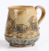 A Hannah Barlow for Doulton Lambeth pottery jug, the tapering body incised with depictions of four