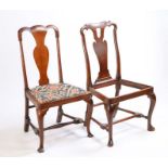 Two George I side chairs, the first with an undulating top rail above a vase splat and drop in