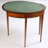A Regency satin wood and mahogany inlaid box front games table, the hinged bow top with urn and