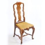 An 18th century Dutch marquetry inlaid tulipwood side chair, with a flowering urn inlaid vase