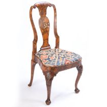 An 18th century Dutch marquetry inlaid oak side chair, with a flowering urn inlaid vase splat