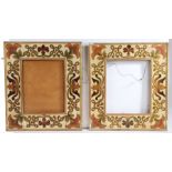 A pair of Arts & Crafts style picture frames, with foliate and scroll painted borders, retailers