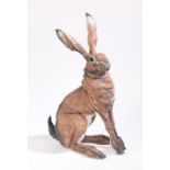 Elaine Peto, a contemporary pottery figure of a hare, modelled in a seated position with ears