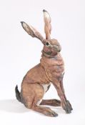 Elaine Peto, a contemporary pottery figure of a hare, modelled in a seated position with ears
