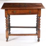 A late 17th Century fruitwood side table, the rectangular top above a long frieze drawer and