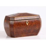 A George III burr walnut and boxwood strung tea caddy, the hinged lid opening to reveal two lidded