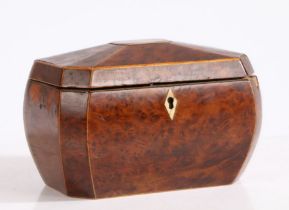 A George III burr walnut and boxwood strung tea caddy, the hinged lid opening to reveal two lidded