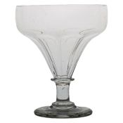 A 19th Century English glass capstan stem toddy rummer, circa 1830, the tapering bowl above a ring